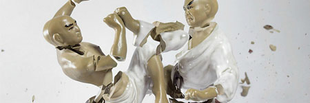 Porcelain Fighting Figures Photographed at The Moment Of Shattering